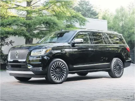 ?? LINCOLN ?? At almost 2,600 kilograms, the Lincoln Navigator is no lightweigh­t — but if you have to carry people and cargo, it works just fine.