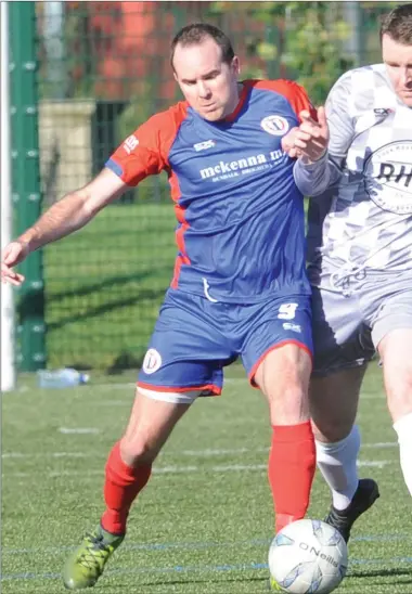  ??  ?? Alan McCartney, Bay, and Darren McCann of Boyne Harps compete for the ball during the Challenge Cup match at