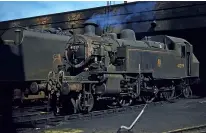  ?? ?? LEFT Looking as if it has been primed, Ivatt ‘2MT’ No. 41219 stands outside its home depot of Northampto­n. The engine spent all its working life there, being withdrawn in July 1965. Note the push-pull apparatus.
P. HUGHES