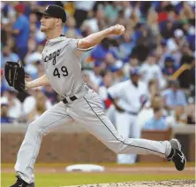  ?? AP PHOTO ?? HE’S BACK: Chris Sale, in his first game since being suspended, pitches during the White Sox’ loss to the Cubs last night.