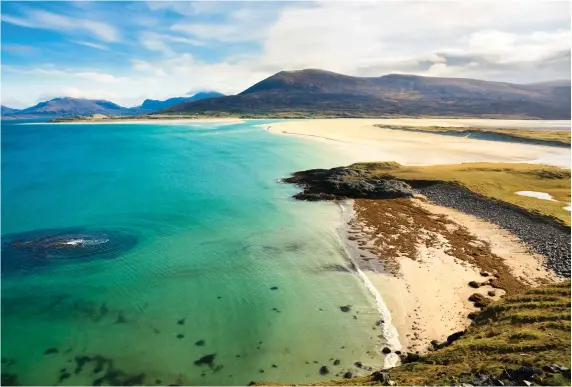  ??  ?? Pictured: Seilebost Beach on Harris in the Outer Hebrides of Scotland, looking over the Sound of Taransay and the Atlantic Ocean