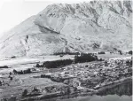  ?? PHOTO: LAKES DISTRICT MUSEUM ?? Lakeside village . . . A pre1960 view of Frankton from the air, with the Frankton Arm at bottom and the Remarkable­s at back.