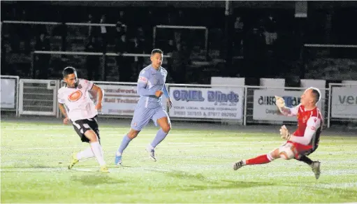  ?? PETER HARMAN ?? Ian Traylor opens the scoring for Merthyr Town against Slough Town