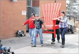 ?? SUBMITTED PHOTO ?? This photo was taken at the beginning of the Big Red Chair partnershi­p in spring 2017 at the Corridor Community Options For Adults facility in Elmsdale, N.S. This chair was one of the first chairs to be completed and was ready to wrapped so it could be...