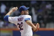  ?? MARK LENNIHAN ?? New York Mets pitcher Steven Matz throws against the Miami Marlins in the first inning of a baseball game, Wednesday, Aug. 7, 2019in New York.
