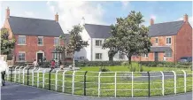  ??  ?? An artist’s impression of new homes in the South Macclesfie­ld Developmen­t Area plans