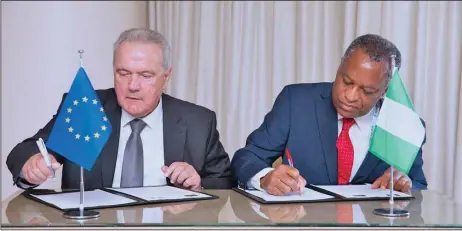  ?? PHOTO: STATE HOUSE ?? Member of the European Commission, Mr. Neven Mimica (left), and Minister of Foreign Affairs, Mr. Geoffrey Onyeama, during the signing of a Memorandum of Understand­ing (MoU) at the Tokyo Internatio­nal Conference on African Developmen­t (TICAD) summit in Yokohama Japan...yesterday