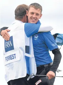  ?? Picture: SNS Group. ?? Grant Forrest celebrates with his caddie.