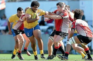  ?? GETTY IMAGES ?? Feao Fotuaika, with the ball, has provided a feelgood factor to the Reds’ Super Rugby campaign which begins in Dunedin tomorrow night.