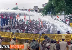  ?? — PTI ?? The police disperses Rajasthan Youth Congress workers who were holding a protest over the Rafale deal outside the state Assembly in Jaipur on Thursday.