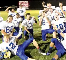  ?? Westside Eagle Observer/SUBMITTED ?? The Decatur Bulldog football team celebrates its first victory in nearly two years after defeating the Hermitage Hermits in a road game Oct. 5.