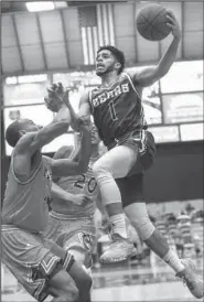  ?? Submitted photo ?? PLAYER OF THE YEAR: Central Arkansas senior guard Jordan Howard (1) puts in a basket during Saturday’s 61-58 victory against Northweste­rn State. Howard was announced Monday as the Southland Conference Player of the Year ahead of the Bears’ second...