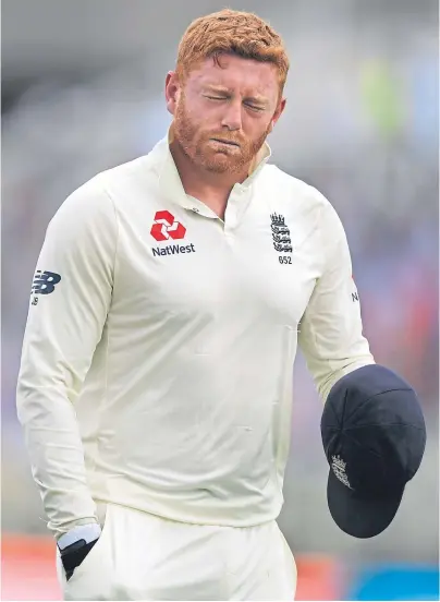  ??  ?? EARLY FINISH: England wicketkeep­er Jonny Bairstow fractured a finger during yesterday’s Test against India