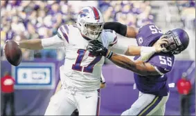  ?? Bruce Kluckhohn / Associated Press ?? Bills rookie QB Josh Allen completed 15 of 22 passes for 196 yards and one touchdown on Sunday at minnesota. He also had two tds rushing.