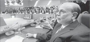  ?? Misha Japaridze
Associated Press ?? FEDERAL RESERVE Chairman Ben S. Bernanke attends the G-20 summit of financial ministers and heads of central banks in Moscow. American officials were careful not to fault ally Japan for its monetary policies.