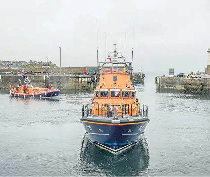  ??  ?? Seafarers’ safety depends on the bravery of lifeboat crews working alongside coastguard teams.