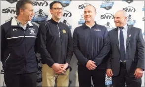  ?? Ned Gerard / Hearst Connecticu­t Media ?? From left, Yale coach Keith Allain, Quinnipiac’s associate head coach Bill Riga, UConn coach Mike Cavanaugh and Sacred Heart’s coach C.J. Marottolo stand together during a press conference at Webster Bank Arena in Bridgeport in 2019.