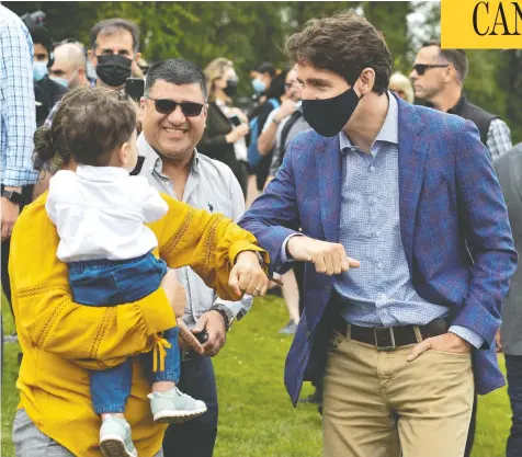  ?? JENNIFER GAUTHIER / REUTERS ?? Prime Minister Justin Trudeau greets people at Town Centre Park in Coquitlam, B.C., last week in what appears to be pre-election campaignin­g.