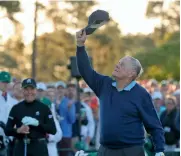  ?? AP ?? Jack Nicklaus tips his hat skyward in honour of the late Arnold Palmer, as Gary Player looks on before the ceremonial teeoff of the Masters on Thursday. —