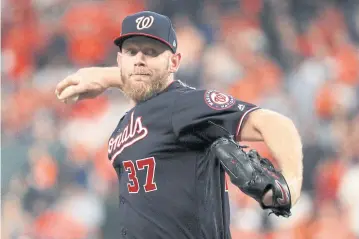  ?? AP ?? Nationals starting pitcher Stephen Strasburg throws against the Astros during the first inning of Game Six of the World Series.