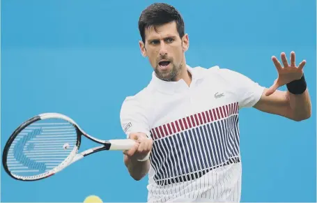  ??  ?? Novak Djokovic on the way to victory over Vasek Pospisil in the Aegon Internatio­nal at Eastbourne yesterday.