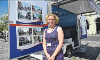  ?? Picture: Gary Browne FM4811773 ?? Fran Wallis, local economy project officer for Maidstone council, in Jubilee Square, Maidstone with a display of plans for the regenerati­on of Week Street and Gabriels Hill