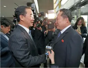  ?? AFP ?? South Korea Unificatio­n Minister Cho Myung-gyun (left) greets North Korean chief delegate Ri Songwon before their meeting at Panmunjom in the Demilitari­sed Zone. —