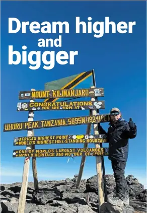  ?? Photos: POH ying LOO ?? The writer at the uhuru Peak, the highest point of Mount Kilimanjar­o. —