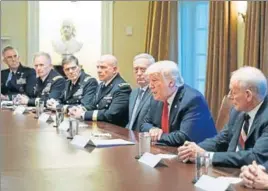  ?? AFP ?? US President Donald Trump, flanked by his defence secretary James Mattis (left) and Chief of Staff John Kelly (right), meets with senior military leaders in the White House on Thursday.