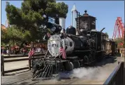  ?? KEITH DURFLINGER — SOUTHERN CALIFORNIA NEWS GROUP ?? The Calico Railroad steam engine fires up as Knott's Berry Farm at Buena Park on June 14, 2017.