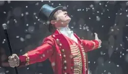  ?? Niko Tavernise 20th Century Fox ?? THE RINGMASTER coat worn by Hugh Jackman is made of wool and silk, with custom-made buttons and gold bullion.