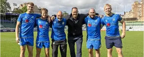  ?? PICTURE: Team Bath Press ?? Nathan Black, commercial director for Dragon Group (third from right), with University of Bath head of rugby Aaron James (third from left) and men’s 1st XV players (from left) Tom Berry, Elis Horgan, Zak Giannini and Ed Shepherdso­n