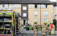  ??  ?? Firefighte­rs attend the fire in Tay Road, Mastrick