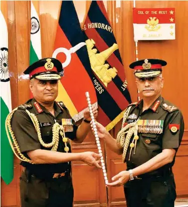  ?? PHOTOGRAPH: adgpi / Twitter ?? General Manoj Pande (left) takes over as the 29th COAS of Indian Army from General M.M. Naravane (right)