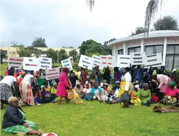  ??  ?? Some of the demonstrat­ors gathered at Mutare Hall on Wednesday