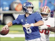  ?? Jim Mcisaac / Getty Images ?? Daniel Jones will look to get New York’s offense going against Dallas, which has the NFL’S third-worst defense.