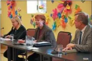  ?? MARIAN DENNIS – DIGITAL FIRST MEDIA ?? From left, Secretary of Banking and Securities Robin L. Wiessman, Secretary of Aging Teresa Osborne and Revenue Secretary Dan Hassell talk about prevention and help available to residents affected by scams.