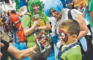  ?? Denver Post file ?? Ian Onstott, 6, checks out his Spider-Man face paint at Denver Comic Con in July 2017. This year’s event will feature two major Harry Potter stars, among others.