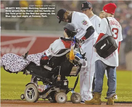  ?? STAFF PHOTO BY JOHN WILCOX ?? HEARTY WELCOME: Retiring legend David Ortiz greets Pete Frates and his family on the field prior to the Red Sox game vs. the Blue Jays last night at Fenway Park.