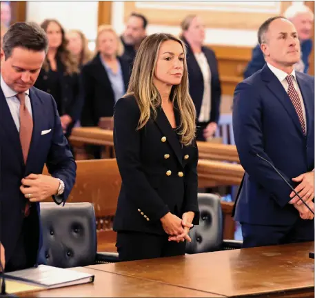  ?? MATT STONE — BOSTON HERALD ?? Defense attorneys Alan Jackson and David Yannetti stand with their client Karen Read at a Norfolk County Superior Court hearing in February. It’s game on when the trial starts next week.