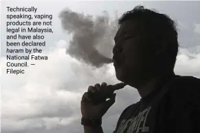 ??  ?? technicall­y speaking, vaping products are not legal in malaysia, and have also been declared haram by the national Fatwa Council. — Filepic