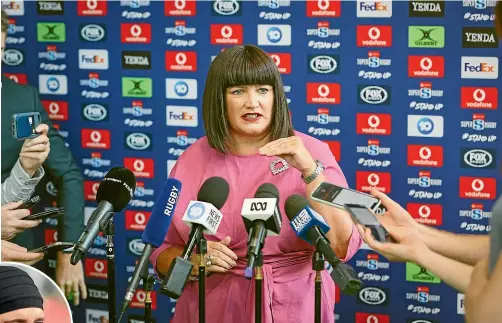  ?? GETTY IMAGES ?? Rugby Australia chief executive Raelene Castle is accustomed to the media glare while, inset, she often wears bandanas when her hair condition worsens.