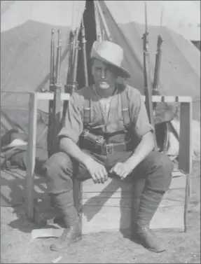  ?? MENNONITE ARCHIVES OF ONTARIO ?? Gordon Eby poses for a photo in the 118th Battalion’s camp at Camp Borden in 1916.