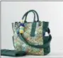  ?? POTTERY BARN KIDS VIA THE ASSOCIATED PRESS ?? Designer Justina Blakeney’s Tigress diaper bag pairs one of Blakeney’s signature boho prints with thoughtful features like a magnetic closure, dog clip, and both handles and shoulder strap for carrying options.