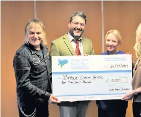  ??  ?? ● Pictured from left: Mike Peters, Mr Ilyas Khattak, Consultant Oncoplasti­c Breast Surgeon, Breast Care Specialist Nurse Mared Williams and Jules Peters.