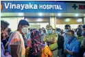  ?? PTI ?? Relatives throng Vinayak Hospital in Nallasopar­a in Palghar district on Monday night. —