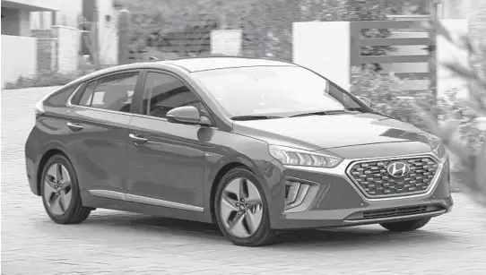  ?? HYUNDAI ?? The Hyundai Ioniq, a car offered solely as a hybrid, plug-in hybrid and electric vehicle with prices starting at $23,200, is an attractive five-door hatchback.