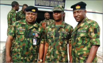  ??  ?? Commander Anyikwa (left) , Commander Roy Nweke (middle) and Commander Otuji (right)