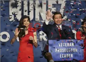  ?? STEPHEN M. DOWELL/ORLANDO SENTINEL VIA AP ?? Ron DeSantis and his wife Casey celebrate after winning the Florida Governor’s race during DeSantis’ party at the Rosen Centre in Orlando on Orlando, Fla., on Tuesday, Nov. 6.