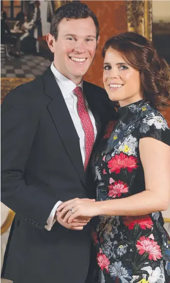  ?? Picture: GETTY IMAGES ?? Jack Brooksbank and Princess Eugenie pose in the Picture Gallery at Buckingham Palace after they announced their engagement.